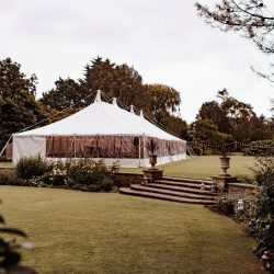 Traditional marquee with festoon lighting built by Archers Marquees at Whitelackington Manor in Taunton, Somerset for a summer wedding