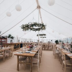 Flower Hoops in a traditional marquee built by Archers Marquees