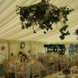 Ivy Hanging Balls in a clearspan marquee built by Archers Marquees